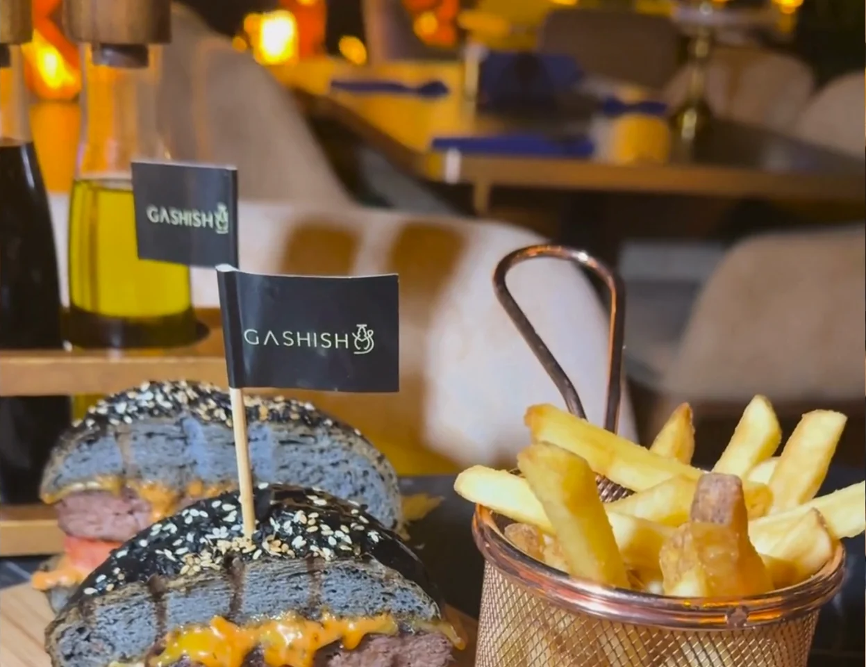 Burgers with Gashisha flags and a basket of fries