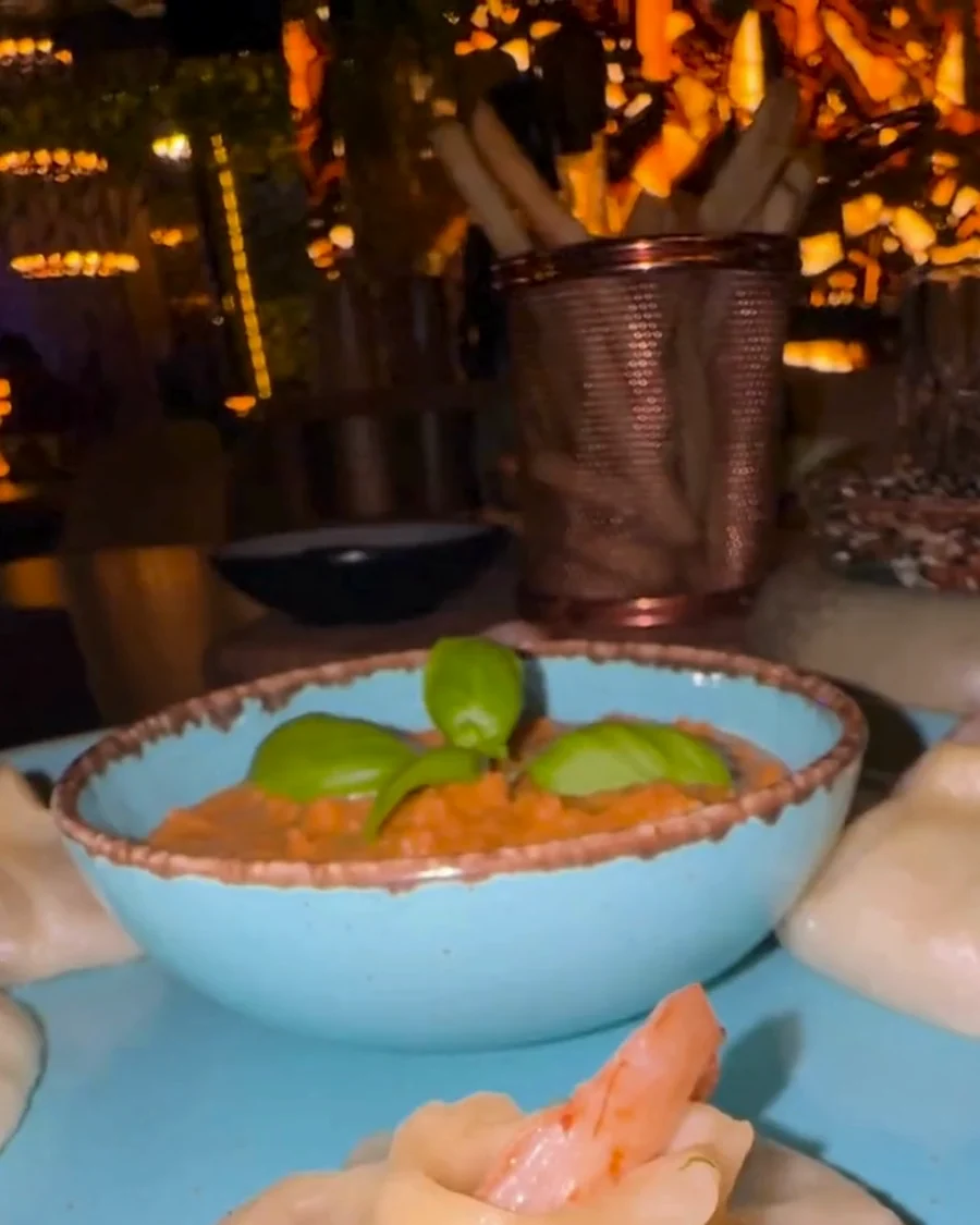 Blue bowl of dip with basil at Gashisha Lounge