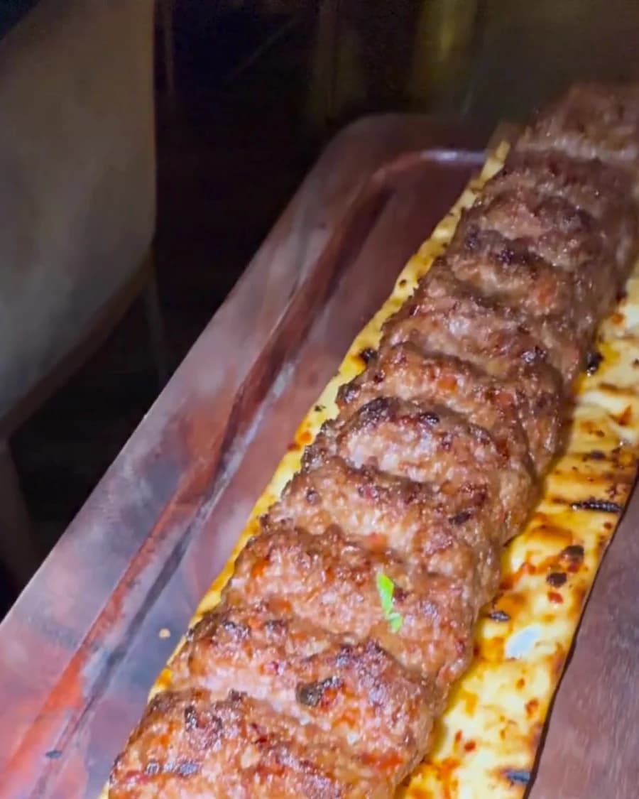 Long kebab on flatbread at Gashisha Lounge
